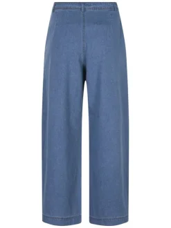 Jean oversize taille haute en coton bleu denim avec une coupe oversize
