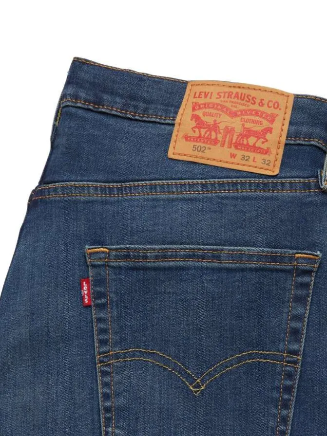 Jean 5 poches 502 en coton mélangé bleu avec surpiqûres orange et coupe droite