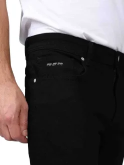 Jean 5 poches en coton noir à coupe slim avec logo gris brodé
