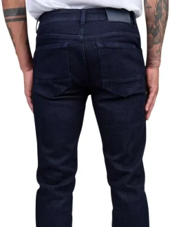 Jean 5 poches indigo en coton avec logo tricolore brodé et une coupe slim
