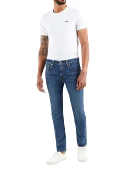 Jean 5 poches 512 Slim Taper en coton bleu uni à coupe slim à taille intermédiaire