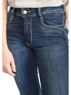 Jean Pulp High Regular en coton indigo uni avec une coupe ajustée et des surpiqûres oranges