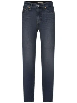 Jean slim en coton indigo uni avec une coupe slim et une taille intermédiaire