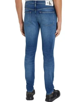 Jean Slim Taper en coton mélangé bleu avec une coupe slim et 3 poches avants