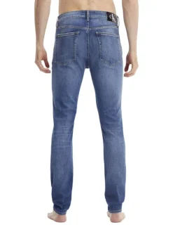 Jean Slim Taper en coton mélangé indigo effet délavé coupe slim avec 5 poches