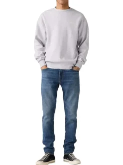 Jean 512® Taper bleu en coton à coupe slim avec un patch de la marque