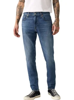 Jean 512® Taper bleu en coton à coupe slim avec un patch de la marque