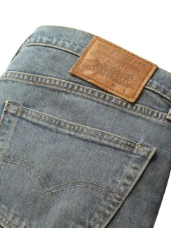 Jean 502® Taper gris clair en coton à coupe droite et patch de la marque
