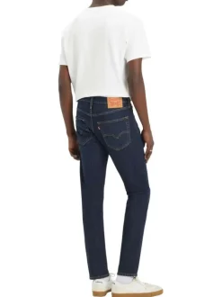 Jean 512® Taper indigo à coupe slim avec un patch de la marque