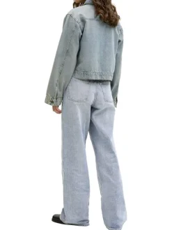 Jean Tokyo en coton bleu pourvu d'une fermeture zippée et boutonnée