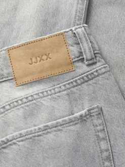 Jean Tokyo en coton gris pourvu d'une coupe ample et du patch de la marque