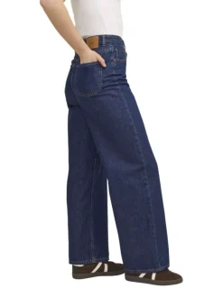 Jean Tokyo en coton indigo uni avec une coupe bootcut et patch de la marque