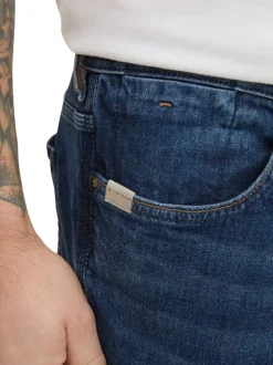 Jean Troy brut en coton avec une coupe slim et un patch à l'arrière