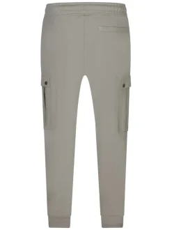 Jogging beige uni avec une coupe droite et deux poches latérales