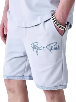 Jogging ciel uni avec le nom de la marque brodé et une coupe droite