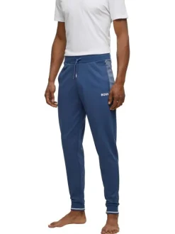 Jogging en coton mélangé bleu uni avec une coupe slim et un lien de serrage