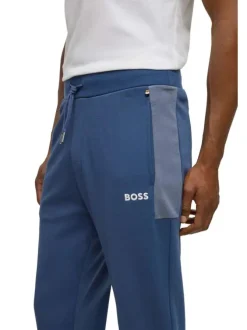 Jogging en coton mélangé bleu uni avec une coupe slim et un lien de serrage