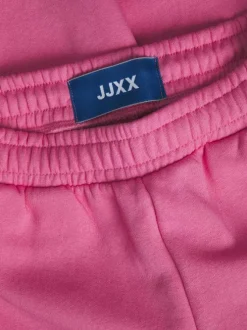 Jogging en coton mélangé rose uni avec une coupe slim fit et à taille élastiquée