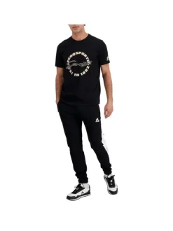 Jogging en coton noir uni avec une coupe slim et bandes blanches