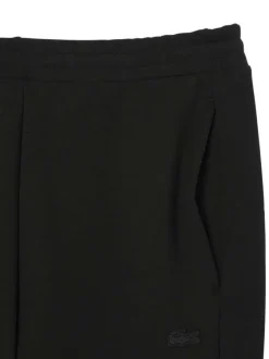 Jogging en coton noir uni avec une coupe slim fit et le logo en petit