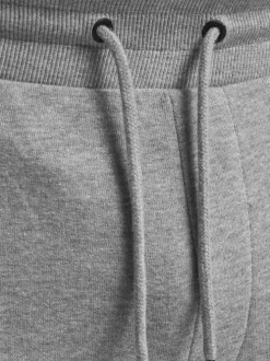 Jogging gris en coton uni avec une coupe droite et nom de la marque sur la cuisse gauche