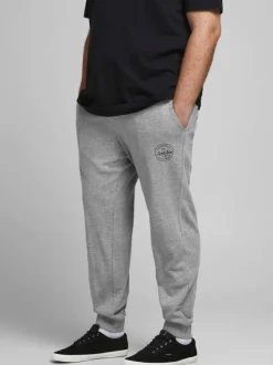 Jogging gris en coton uni avec une coupe droite et nom de la marque sur la cuisse gauche