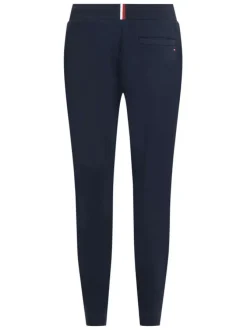 Jogging marine uni avec une coupe slim et un lien de serrage à la taille