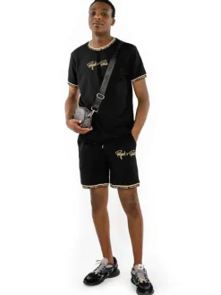Jogging noir uni avec nom de la marque brodé et une coupe droite