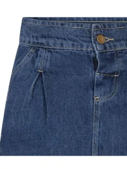 Jupe indigo unie avec une coupe courte arrivant aux genoux