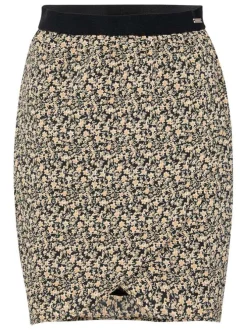 Jupe courte beige liberty avec une coupe droite et une taille noire élastiquée