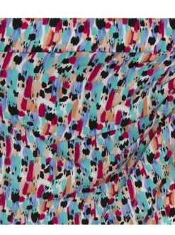 Jupe courte bleue tacheté avec une coupe portefeuille et une taille élastiquée