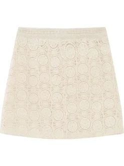 Jupe courte en coton écrue unie avec une coupe droite et un zip