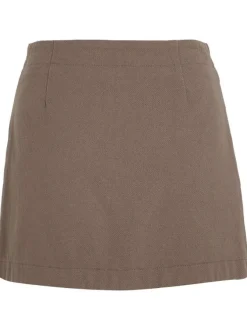 Jupe courte en coton taupe unie avec une coupe droite et logo iconique
