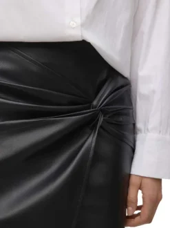 Jupe courte noire unie avec fermeture à glissière et effet drapé
