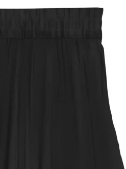 Jupe courte noire unie avec un lien à nouer et une taille élastiquée