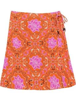 Jupe courte orange à motifs floraux et à coupe portefeuille avec un lien à nouer
