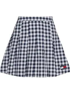 Jupe courte Pleated Mini Skirt en coton blanche vichy avec une coupe évasée