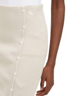 Jupe crayon en coton mélangé beige unie fendue sur le côté gauche