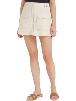 Jupe en coton mélangé beige unie avec une coupe courte et 4 passants