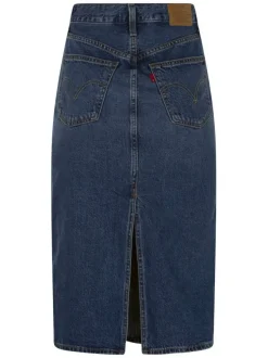 Jupe longue en coton indigo uni avec une coupe droite et une fente arrière