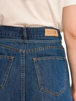 Jupe longue indigo unie pourvue d'une coupe droite et de multiples poches