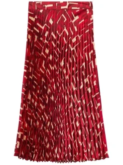 Jupe longue plissée à motif rouge imprimé avec une coupe droite