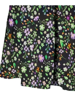 Jupe noire courte et zippée imprimé floral avec une coupe patineuse