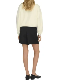 Jupe short courte noire unie en coton biologique avec une coupe fluide
