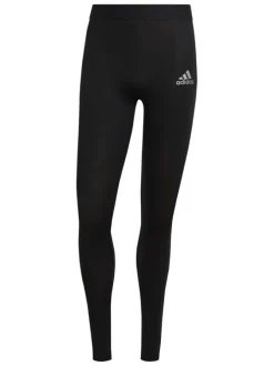 Legging noir coupe skinny avec taille élastiquée et logo floqué sur la cuisse gauche