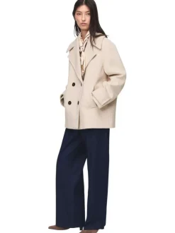 Manteau en laine mélangée écru uni à coupe oversize avec un col à revers