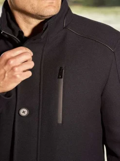 Manteau marine uni coupe droite col montant et zippé