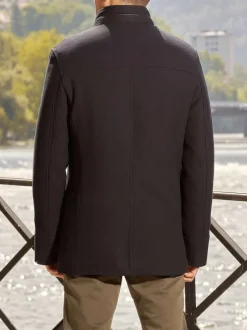 Manteau marine uni coupe droite col montant et zippé