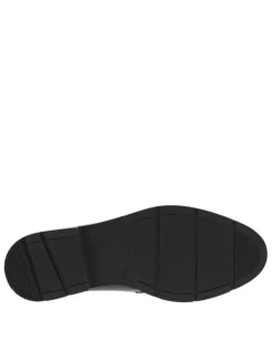 Mocassins en cuir noir à semelle plateau et coupe bateau à enfiler