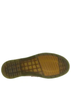 Mocassins marron à semelle à talon plat et avec des franges et un pompon